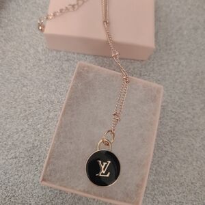 LV black pendant necklace brand new